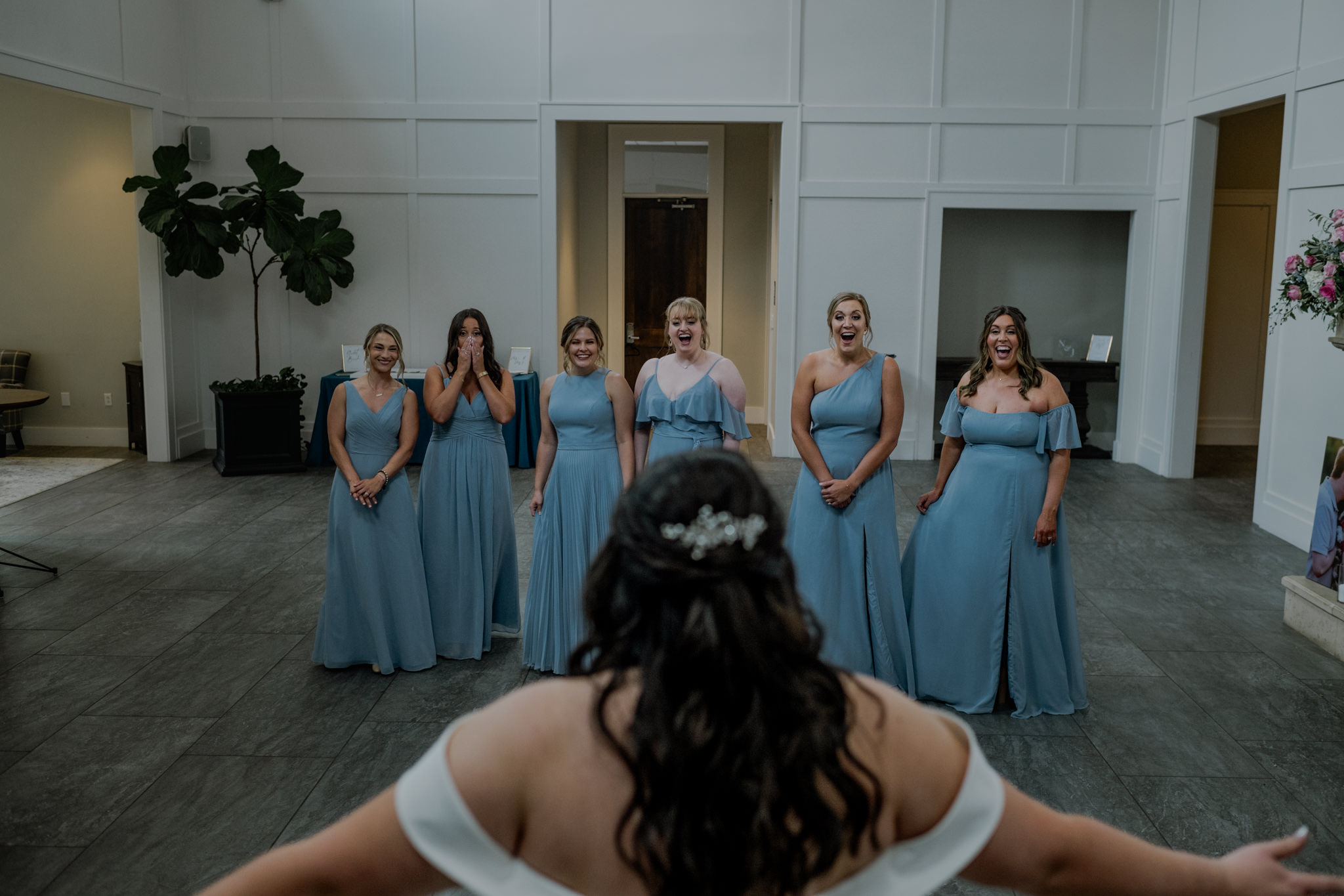 Bride surprises bridesmaids