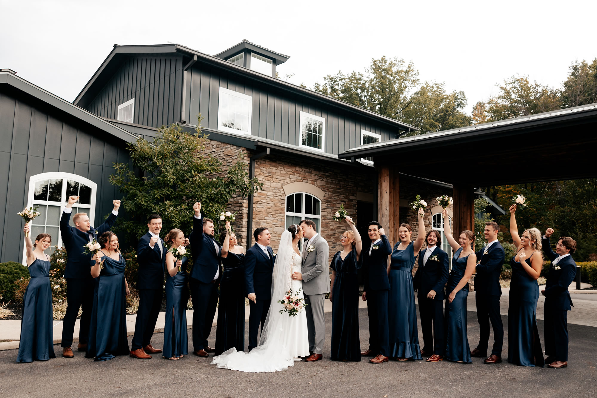Bridal party outside exterior entrance of The Estate