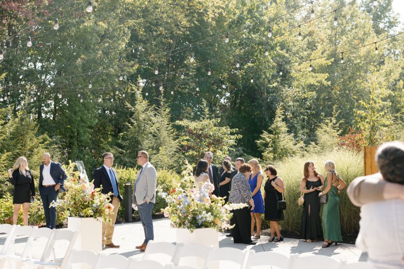 Guests talking before wedding ceremony