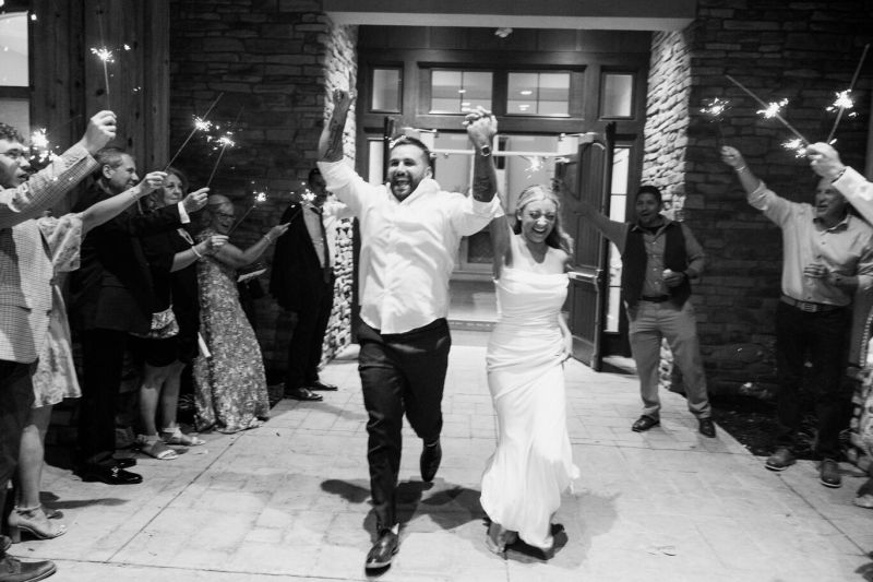 Bride and groom sparkler exit