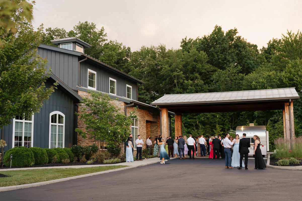 Wedding guests gathered outside the entrance to The Estate at New Albany